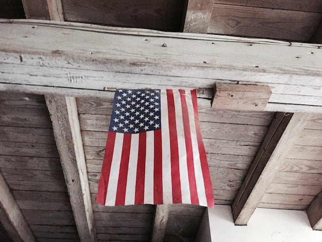 american flag hanging from ceiling