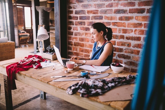 fashion business owner working at a work table